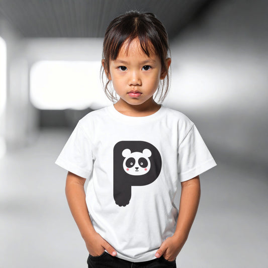 Girl wearing a white cotton t shirt with the letter P in the shape of a panda illustration, hands in pocket