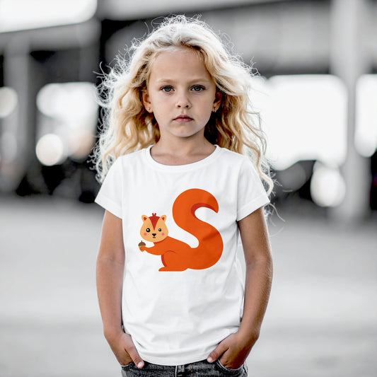 Girl wearing a white cotton t shirt with the letter S in the shape of a squirrel illustration, hands in pocket